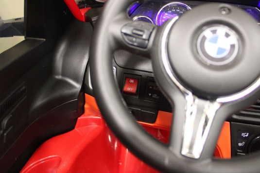 Детский электромобиль BMW X6M (JJ2168) красный